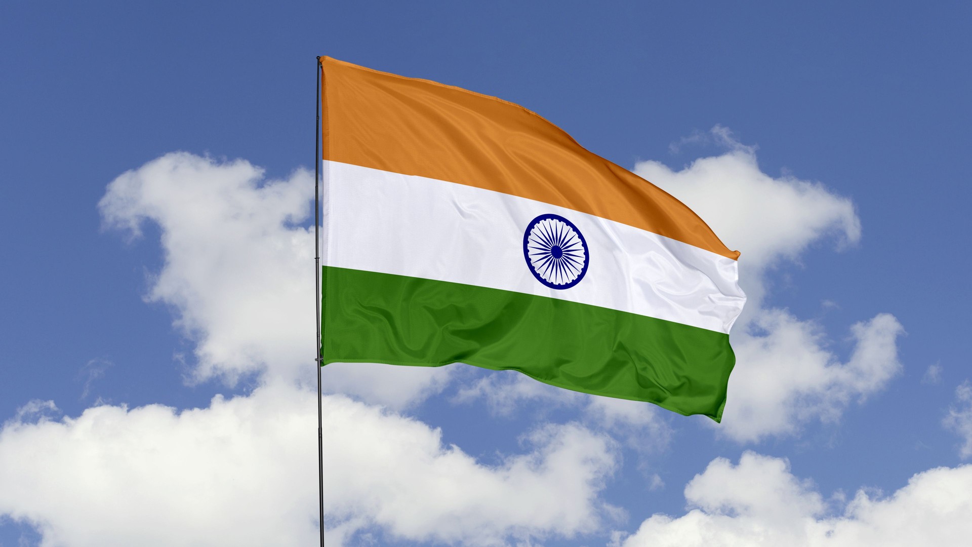 India Flag is Waving Against in the Sky.